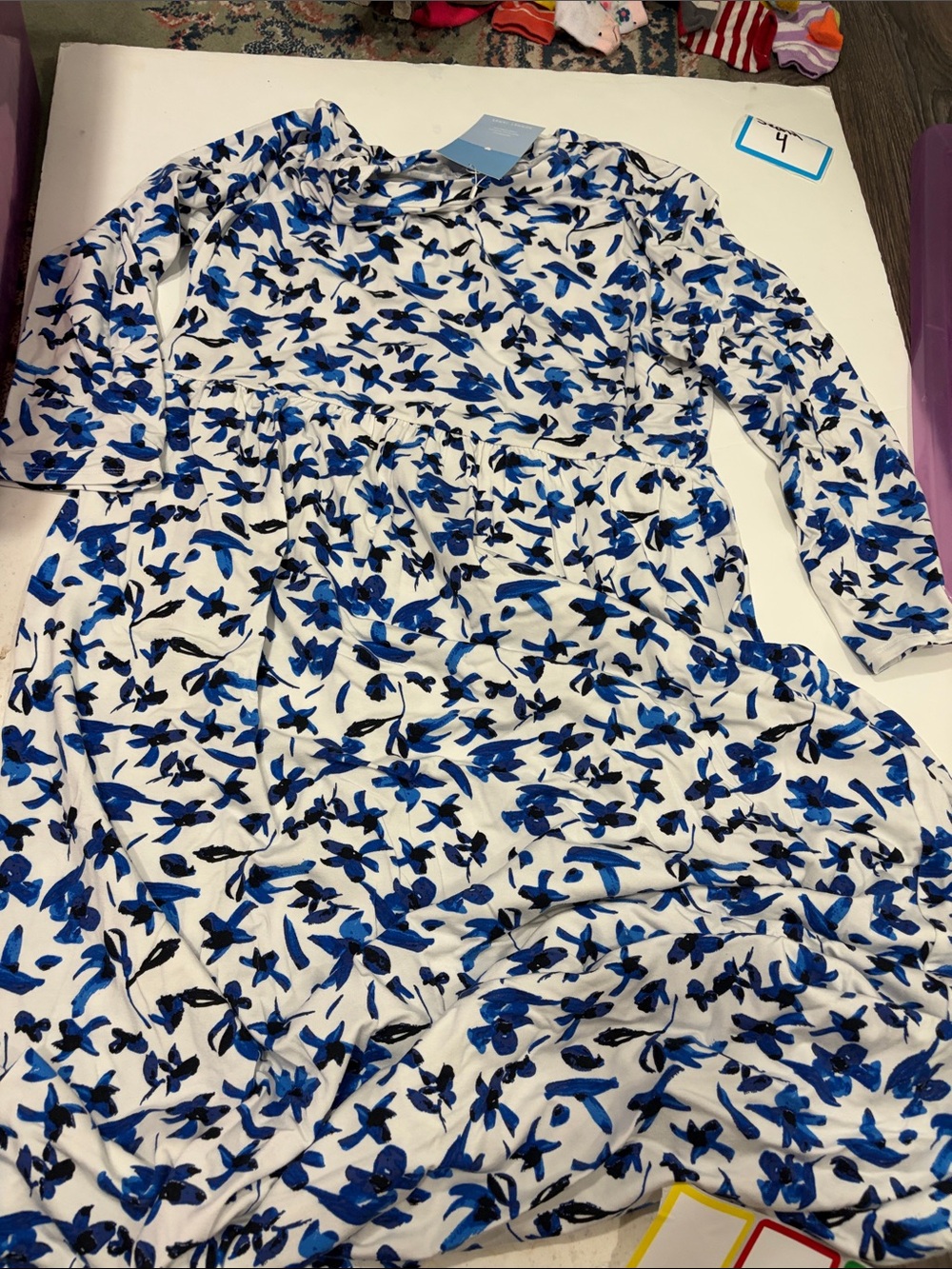 White Midi Dress with Blue Floral Print and Long Sleeves